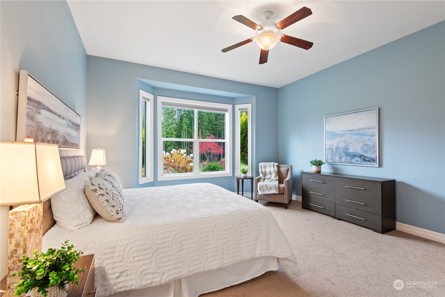 23923 Northeast Adair Road Redmond, WA 98053 - Photo 16 of 38 a bedroom with a bed and a large window