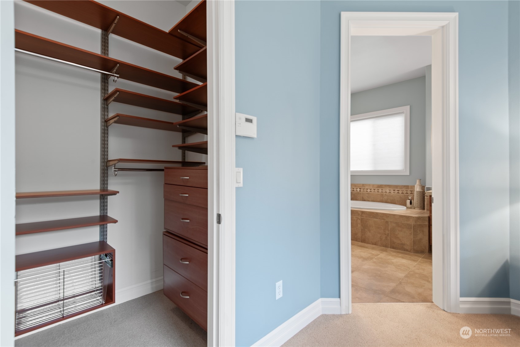 23923 Northeast Adair Road Redmond, WA 98053 - Photo 21 of 38 a view of walk in closet with empty racks