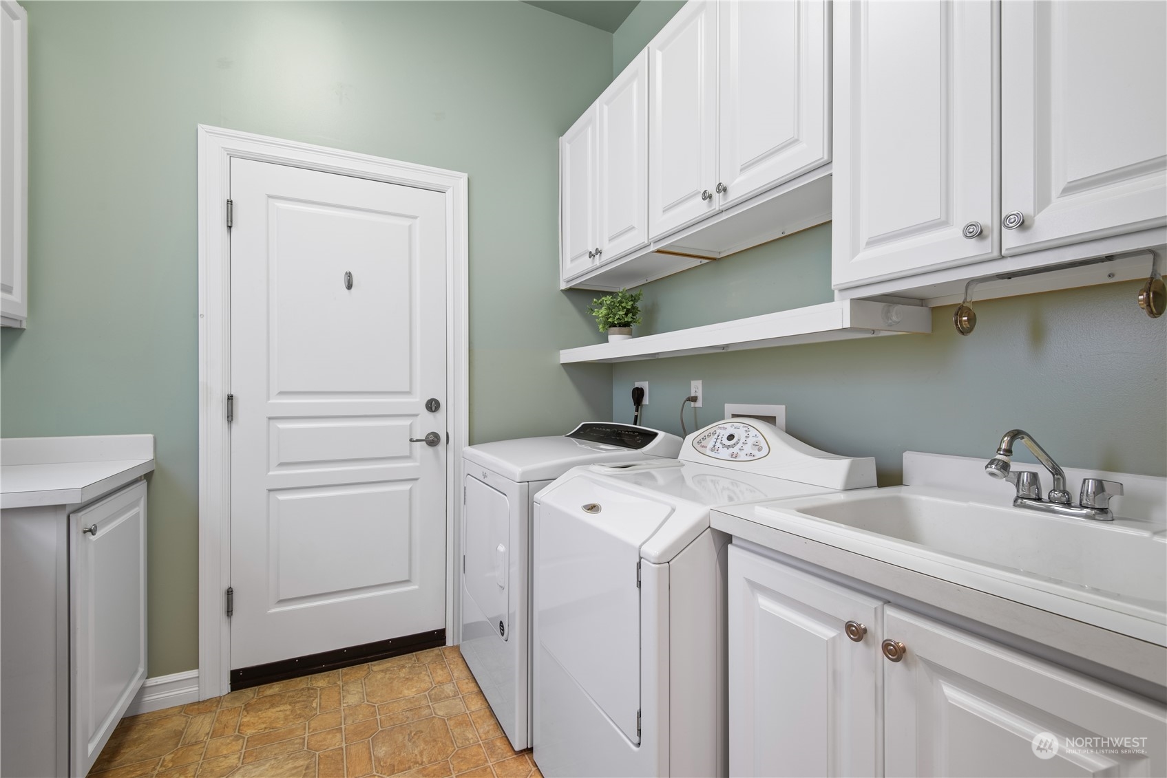 23923 Northeast Adair Road Redmond, WA 98053 - Photo 31 of 38 a utility room with dryer and washer