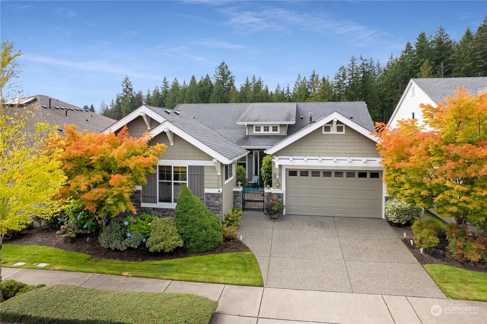 23923 Northeast Adair Road Redmond, WA 98053 - Photo 37 of 38 a view of house with garden