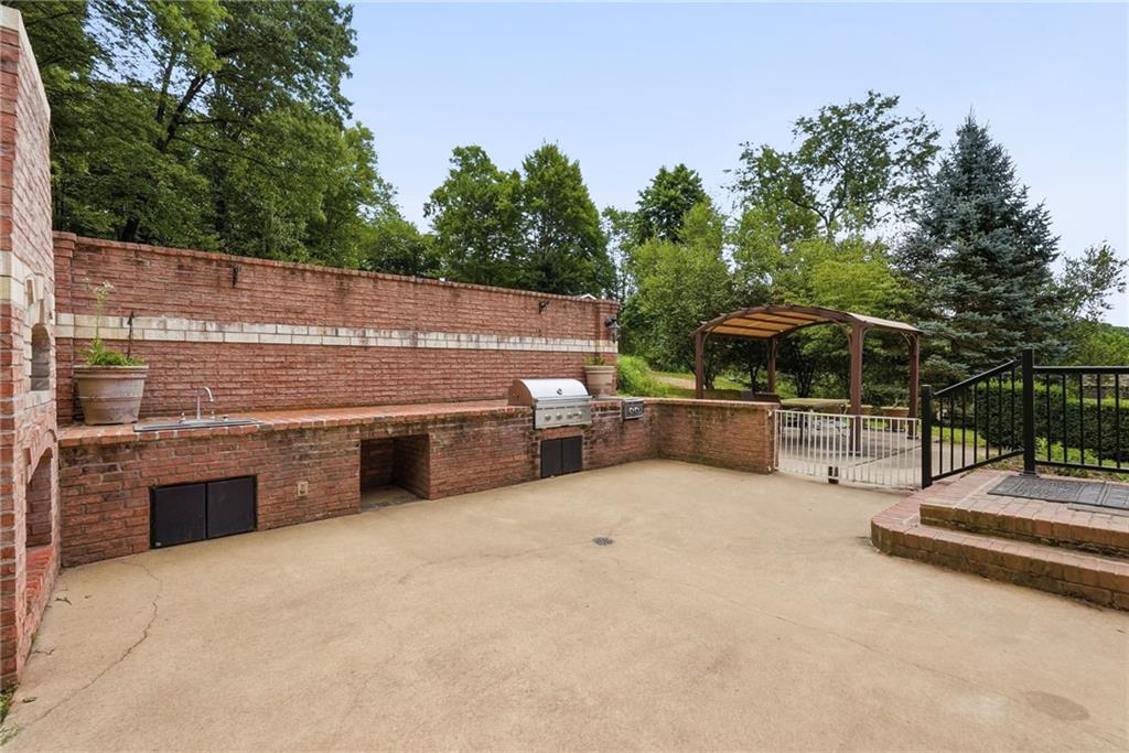809 Franklin Road Mars, PA 16046 - Photo 33 of 44 Brick outdoor kitchen and expansive patio