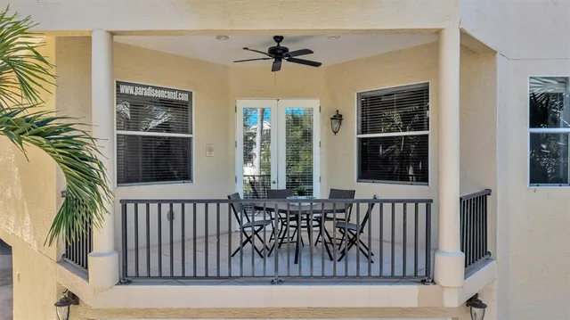 an aerial view of a city with ocean view in back