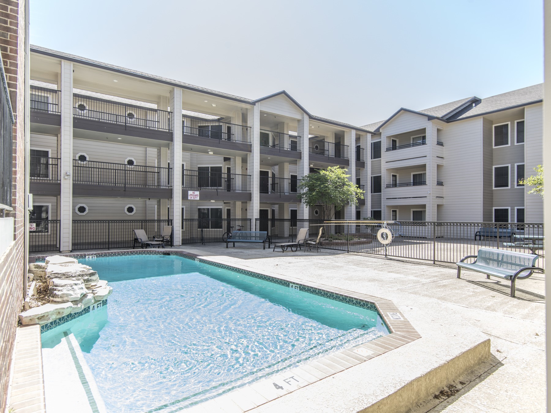 501 West 26th Street, Unit 117 Austin, TX 78705 - Photo 1 of 1 Courtyard and pool
