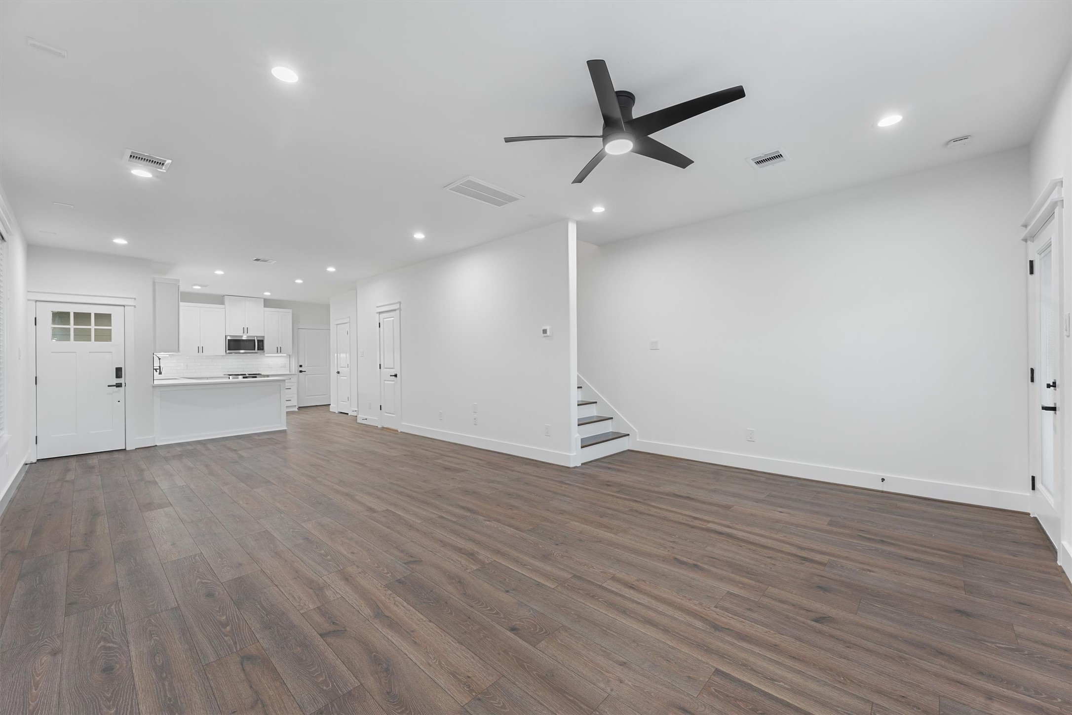 4208 Castor Street, Unit A Houston, TX 77022 - Photo 7 of 23 a view of a kitchen with a sink and wooden floor