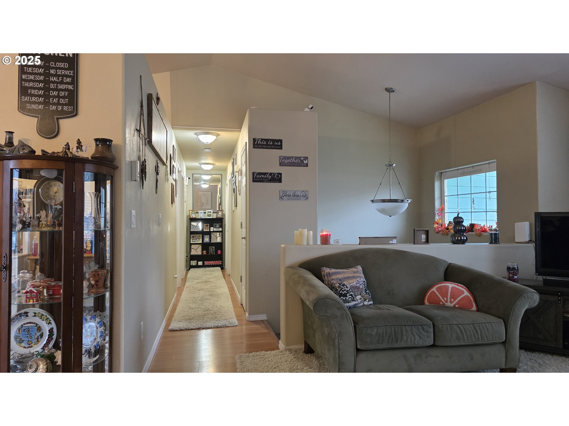 934 South 46th Street Springfield, OR 97478 - Photo 13 of 37 a living room with furniture and a chandelier