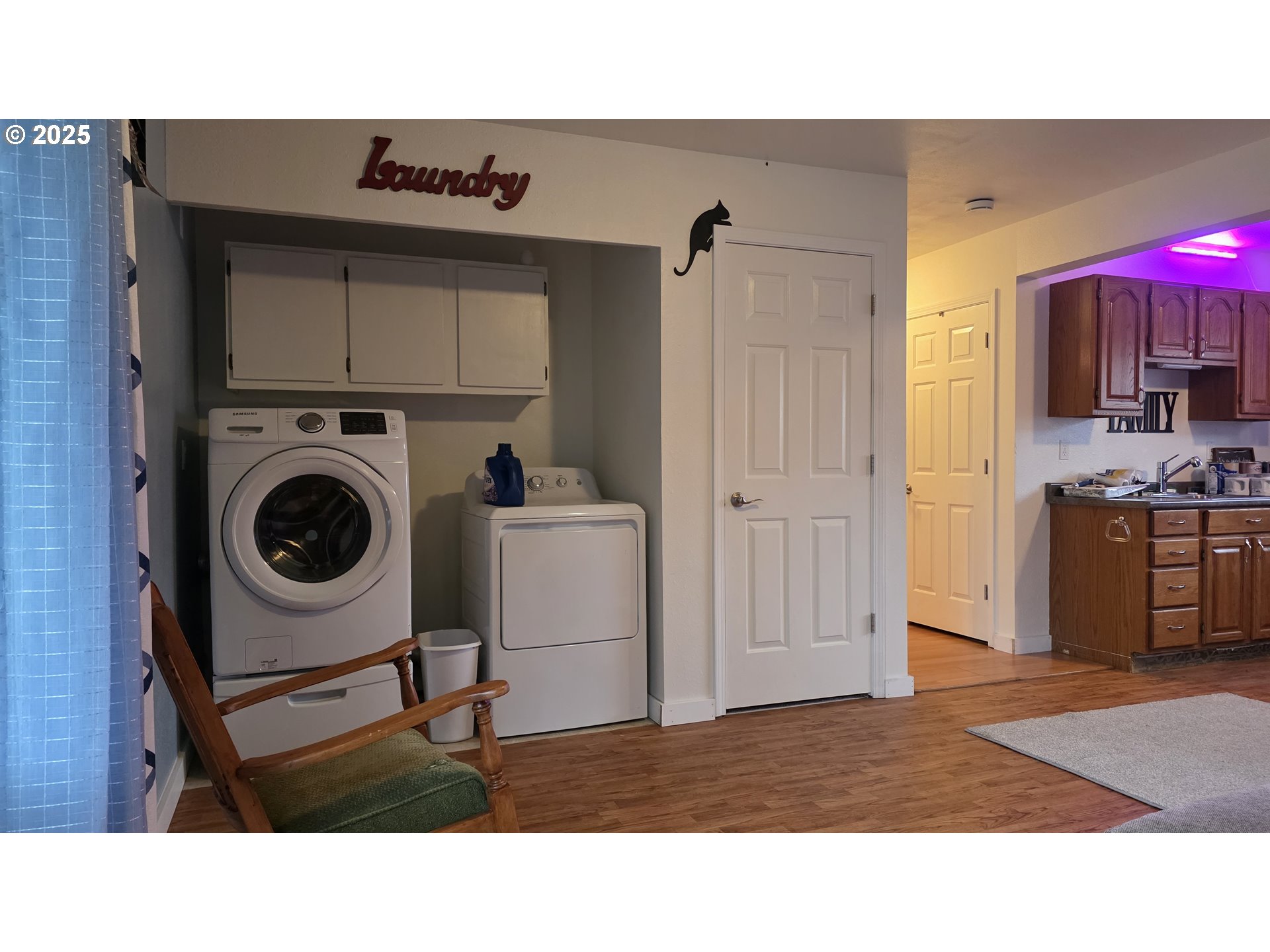 934 South 46th Street Springfield, OR 97478 - Photo 27 of 37 a kitchen with a refrigerator and cabinets