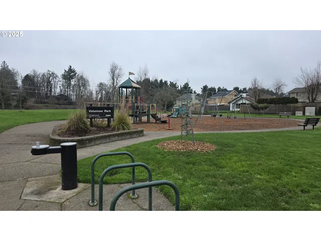 a view of a swimming pool and a yard