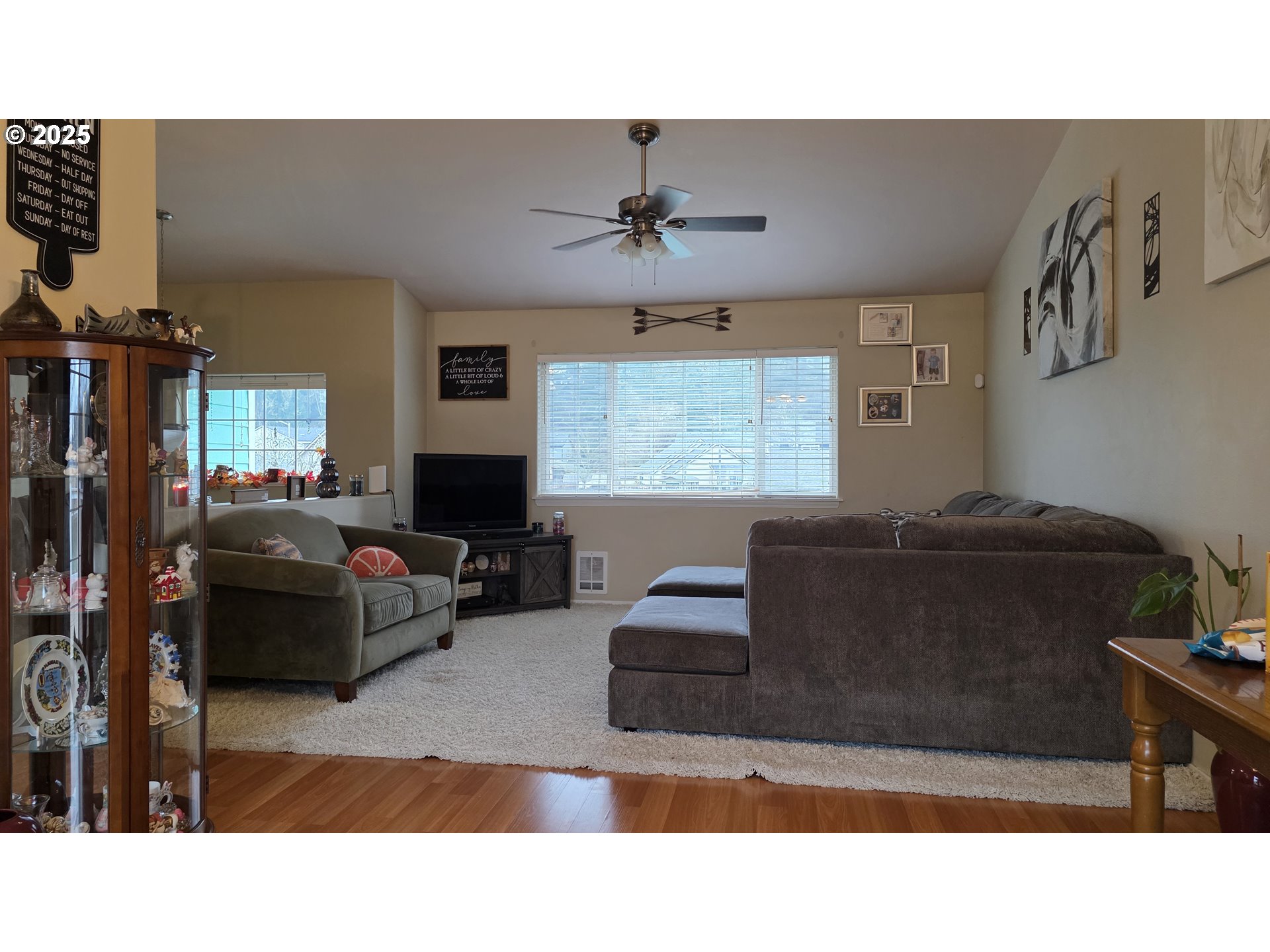 934 South 46th Street Springfield, OR 97478 - Photo 8 of 37 a living room with furniture and a flat screen tv