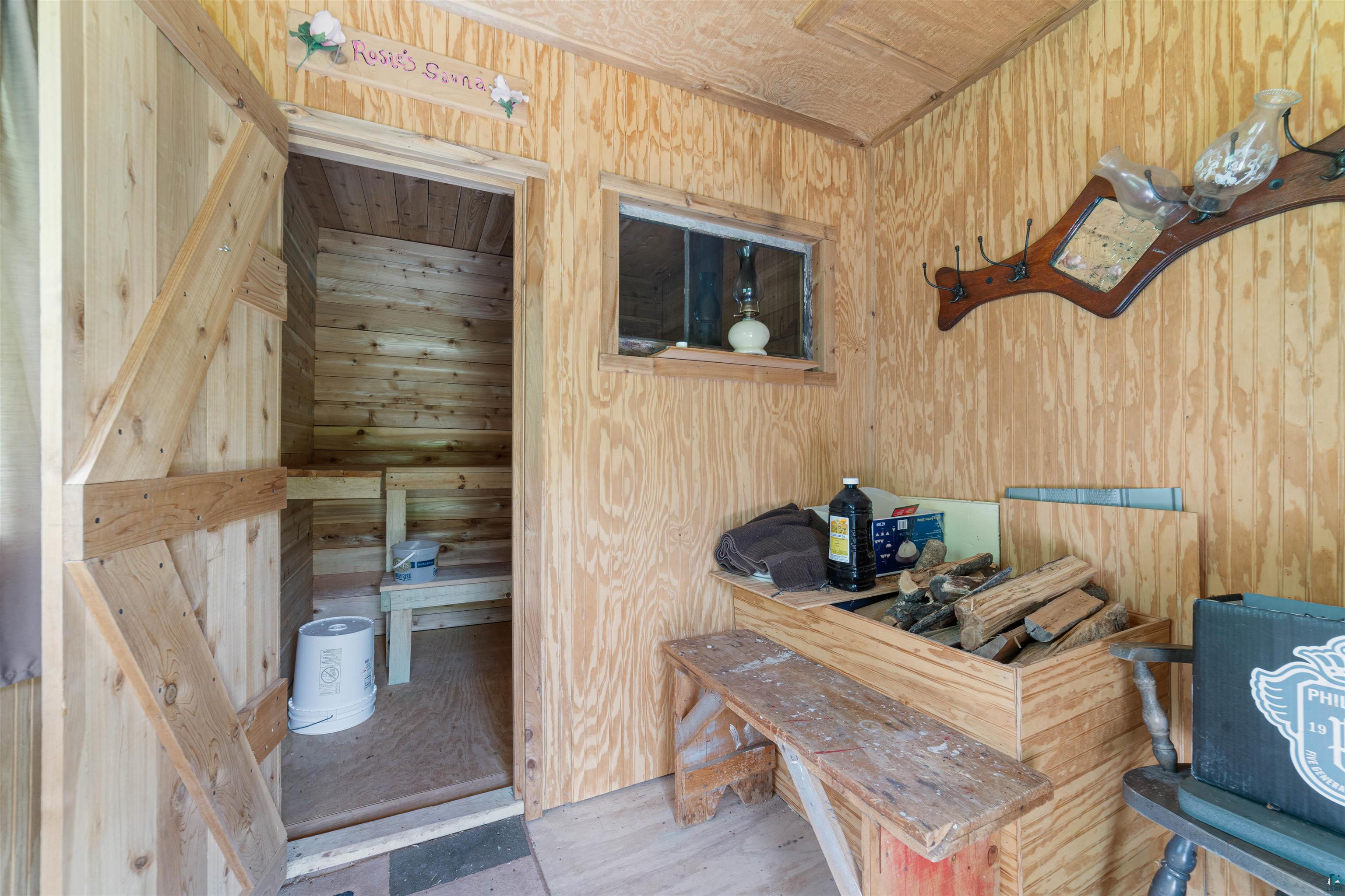 7071 South Warring Road Foxboro, WI 54836 - Photo 19 of 24 View of sauna with wood walls