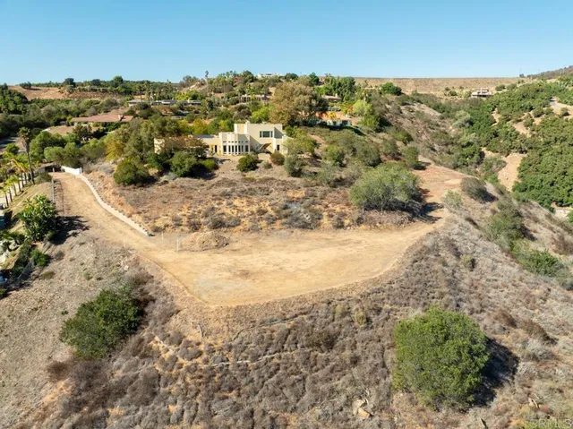 a view of a beach with a mountain