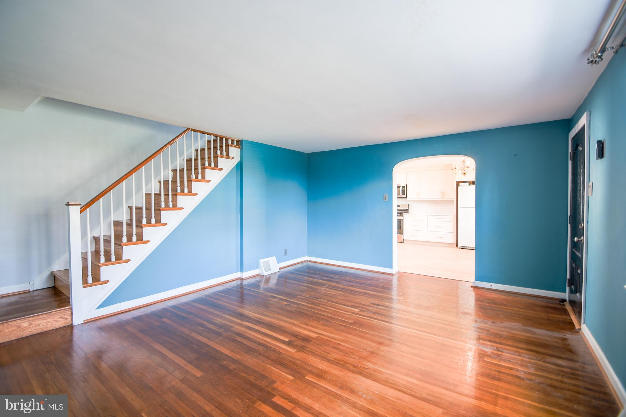 616 Wayne Avenue Springfield, PA 19064 - Photo 11 of 33 a view of an empty room with wooden floor and a window