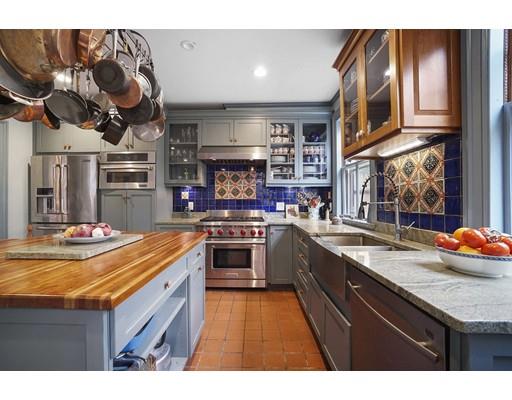 213 Brattle Street Cambridge, MA 02138 - Photo 12 of 30 a kitchen with stainless steel appliances granite countertop a sink a stove and a wooden floors