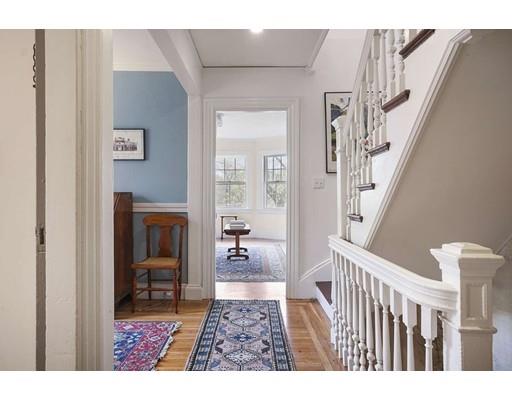 213 Brattle Street Cambridge, MA 02138 - Photo 16 of 30 a living room with furniture and a table