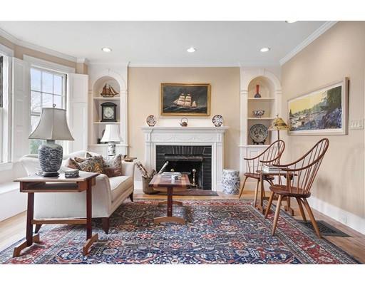 213 Brattle Street Cambridge, MA 02138 - Photo 2 of 30 a living room with furniture and a fireplace