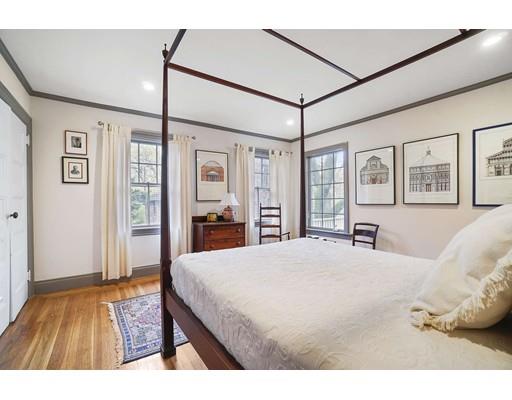 213 Brattle Street Cambridge, MA 02138 - Photo 22 of 30 a spacious bedroom with a bed and a dresser