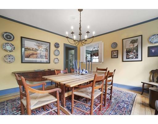 213 Brattle Street Cambridge, MA 02138 - Photo 9 of 30 a view of a dining room with furniture and chandelier