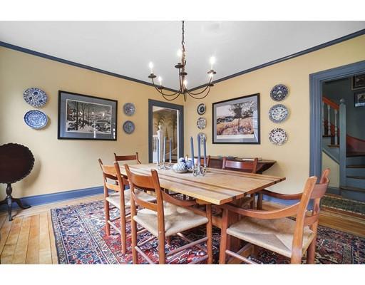 213 Brattle Street Cambridge, MA 02138 - Photo 10 of 30 a view of a dining room with furniture and chandelier