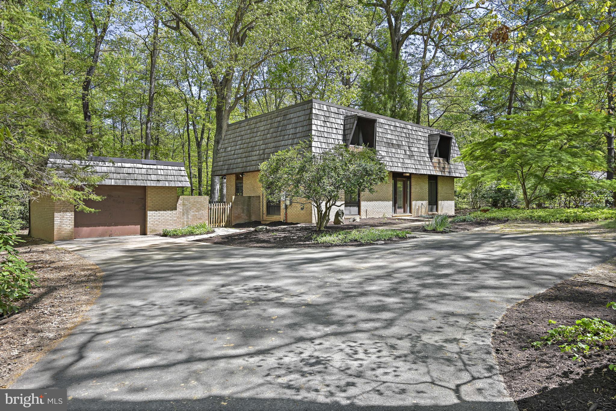 12008 Whip Road Reston, VA 20191 - Photo 3 of 48 Asphalt driveway with extra space for parking.
