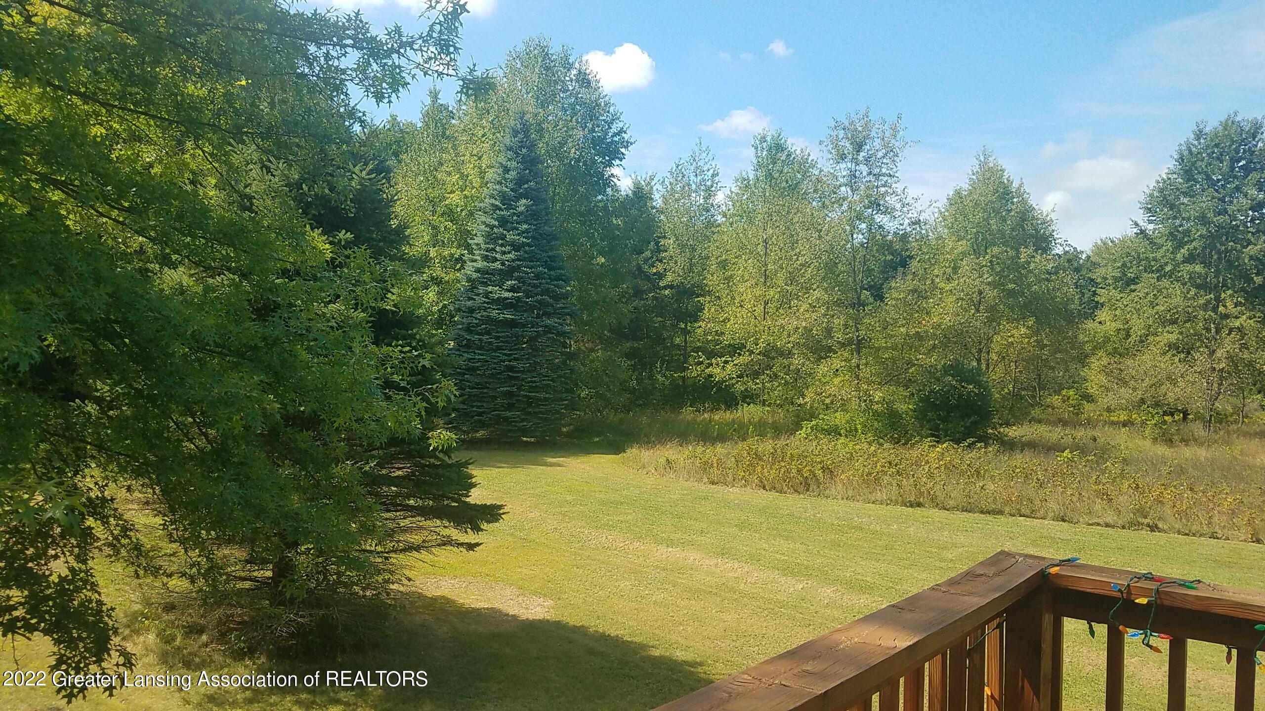 2390 South Edgar Road Mason, MI 48854 - Photo 37 of 40 Exterior rear view from deck