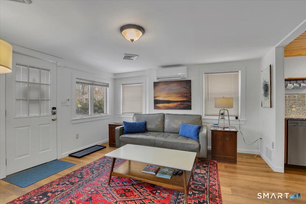5 Seminole Trail East Hampton, CT 06424 - Photo 5 of 22 a living room with furniture and a flat screen tv