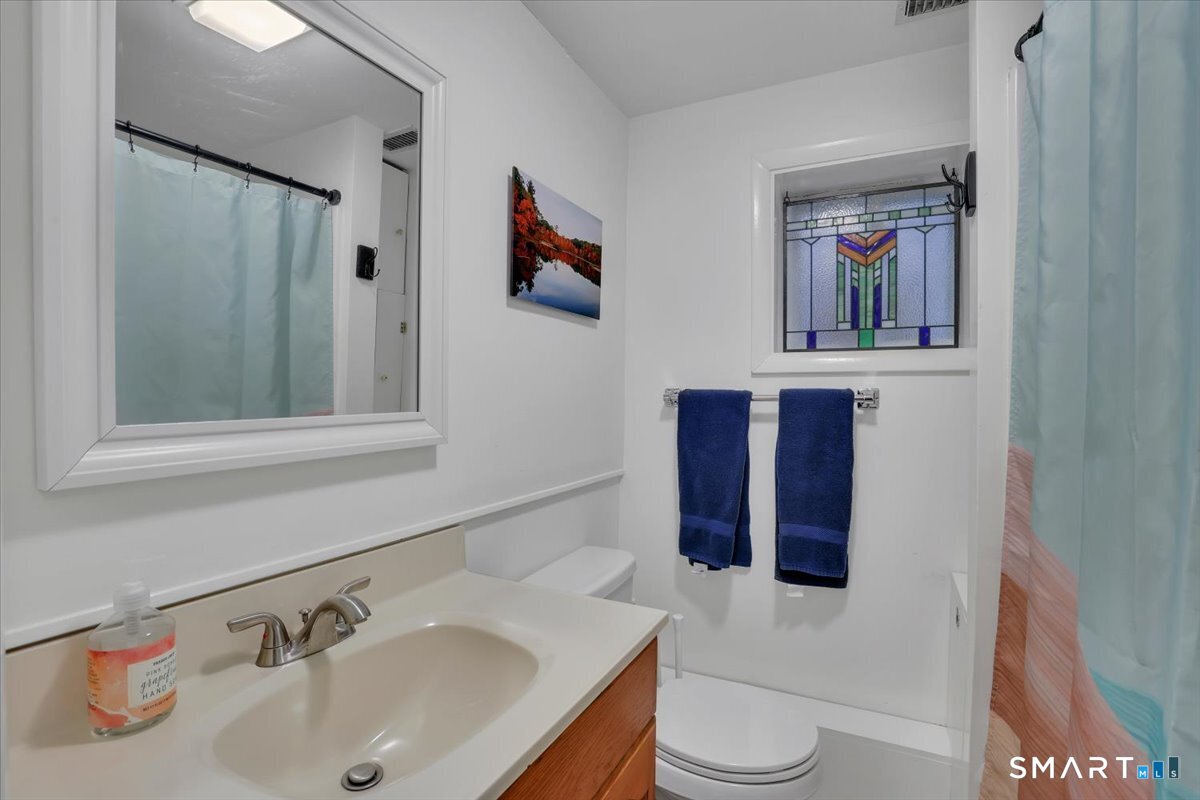 5 Seminole Trail East Hampton, CT 06424 - Photo 9 of 22 a bathroom with a sink and a mirror