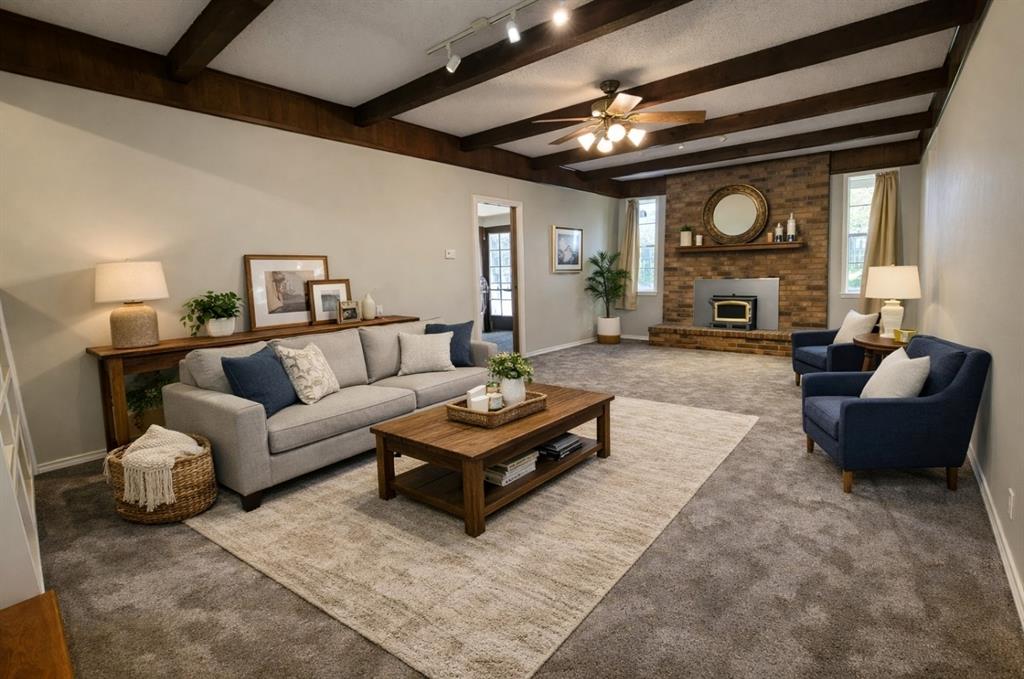 2302 Shiloh Street Denison, TX 75020 - Photo 4 of 16 a living room with furniture and a large window