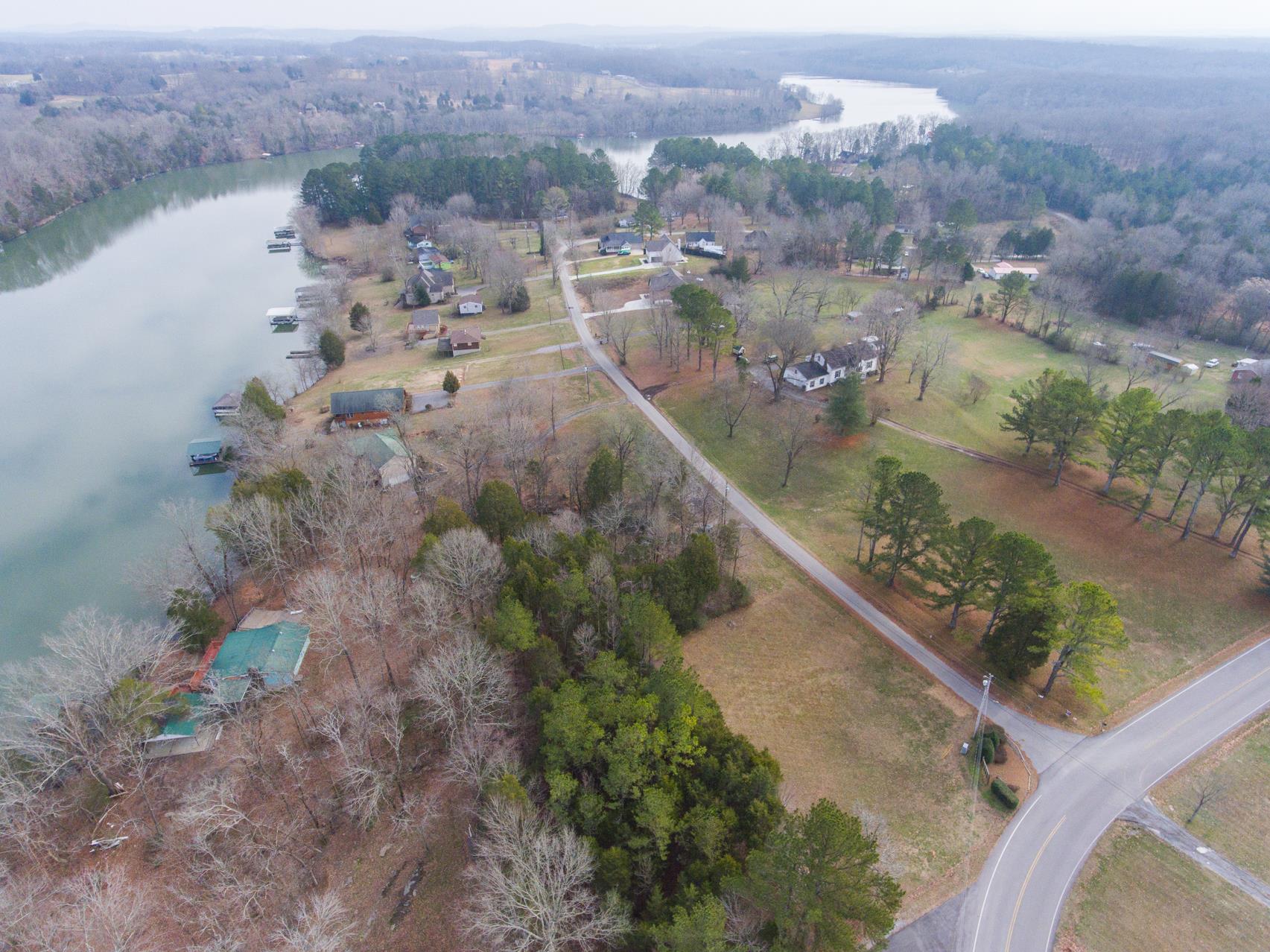 703 Pebble Point Road Lebanon, TN 37087 - Photo 2 of 21 a view of a lake with a mountain in the background