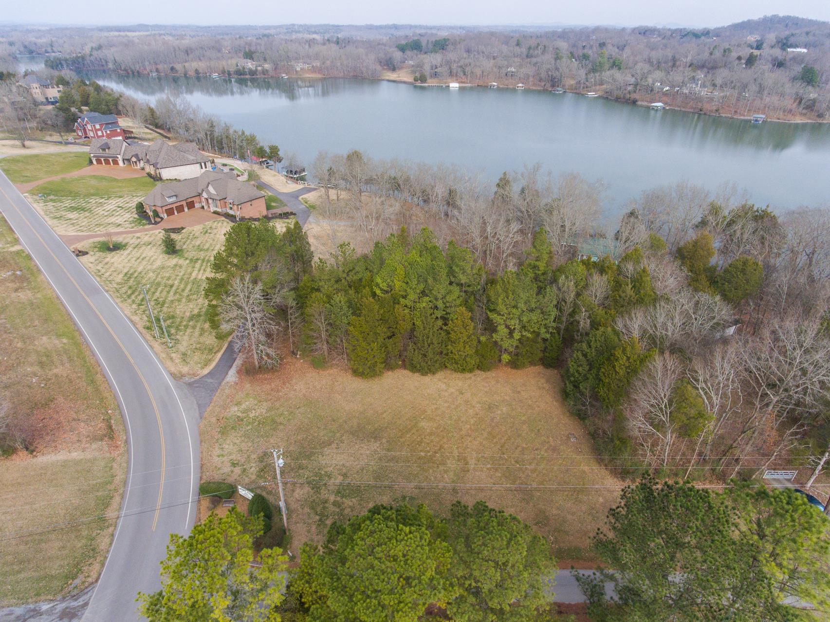 703 Pebble Point Road Lebanon, TN 37087 - Photo 13 of 21 a view of a lake with outdoor space
