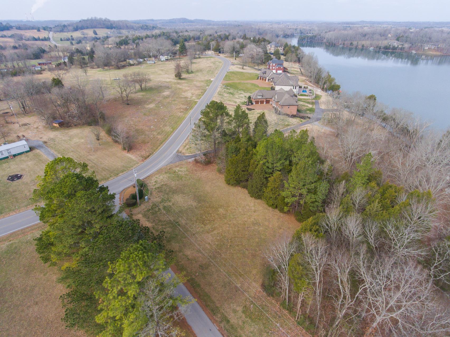 703 Pebble Point Road Lebanon, TN 37087 - Photo 14 of 21 an aerial view of house with yard and lake view