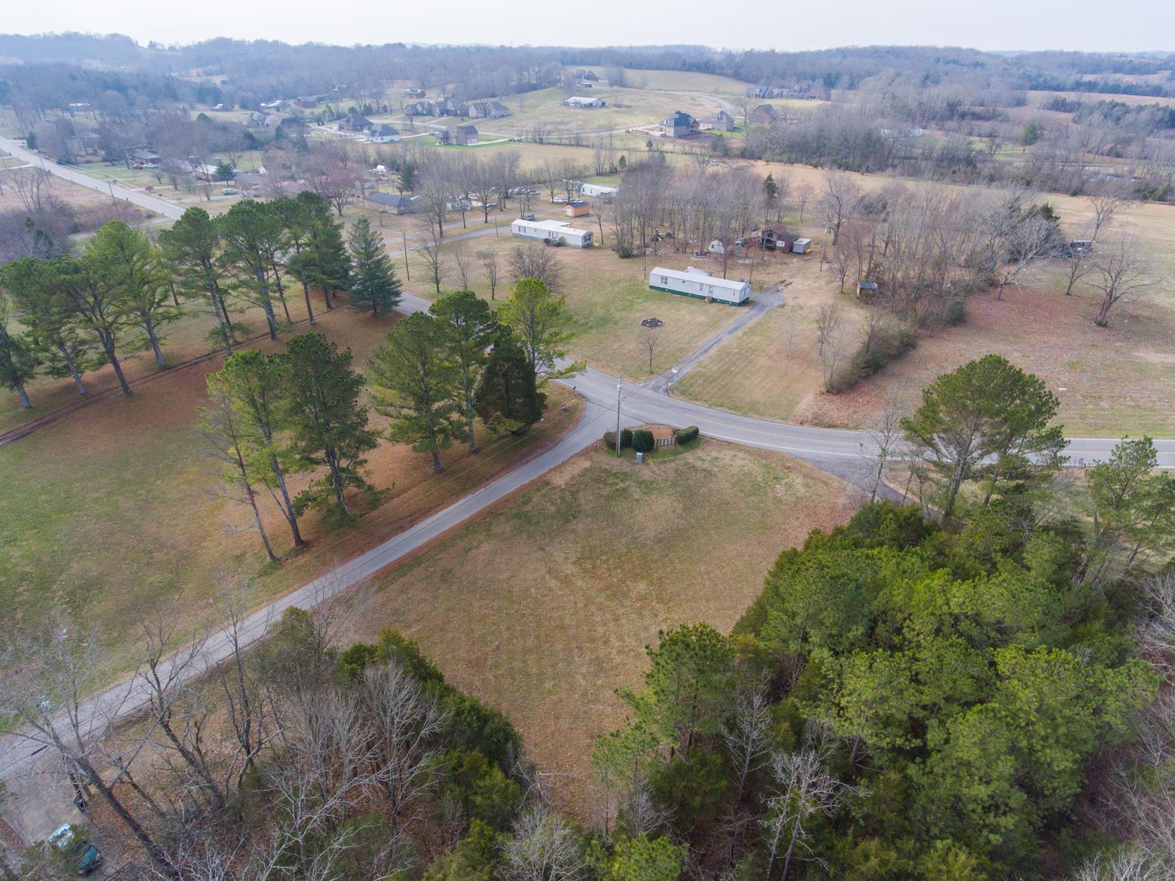 703 Pebble Point Road Lebanon, TN 37087 - Photo 16 of 21 an aerial view of residential houses with outdoor space and trees