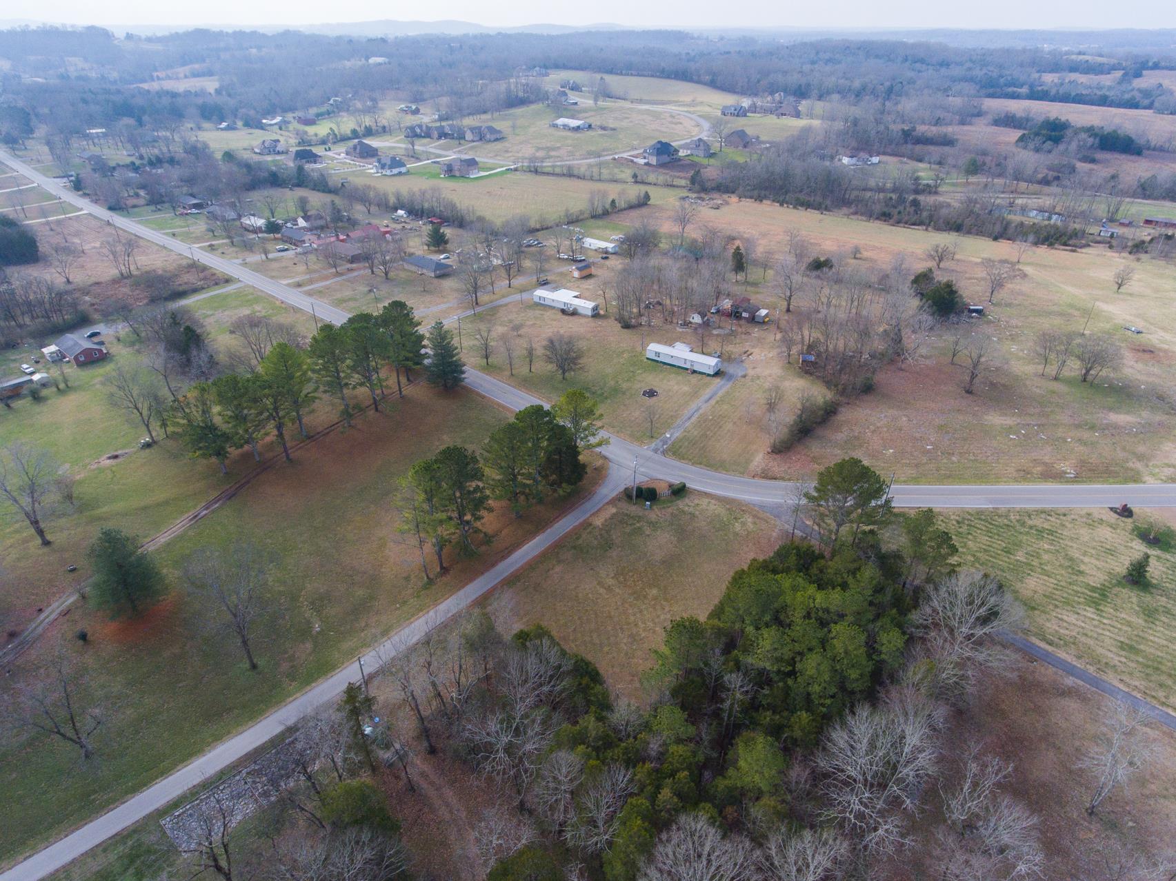 703 Pebble Point Road Lebanon, TN 37087 - Photo 20 of 21 an aerial view of a house with a yard