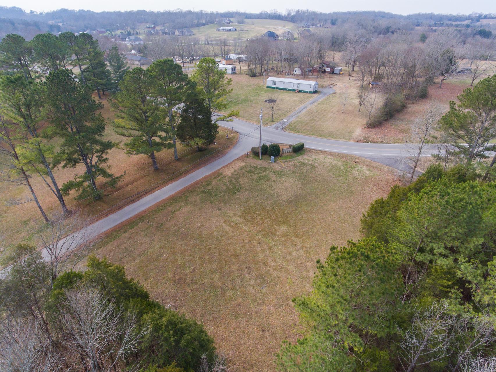703 Pebble Point Road Lebanon, TN 37087 - Photo 5 of 21 an aerial view of residential houses with outdoor space and trees