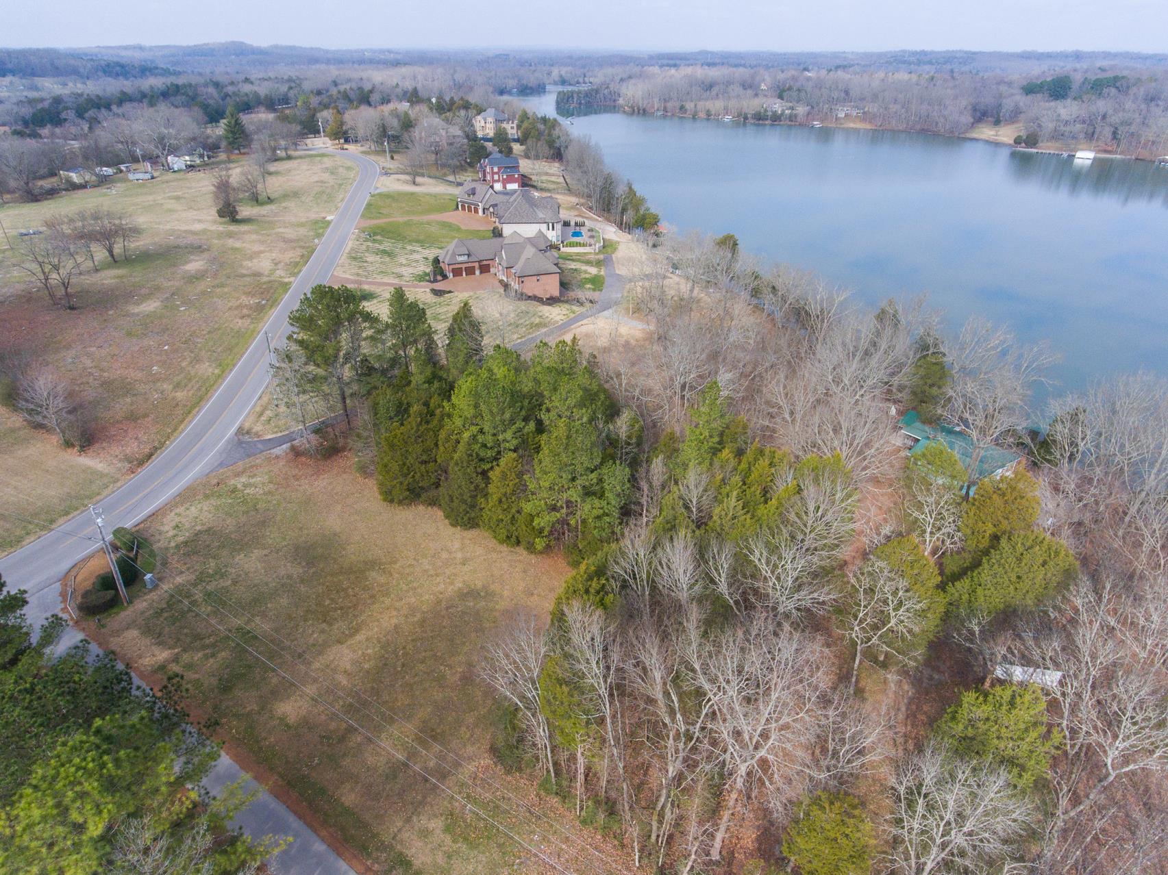 703 Pebble Point Road Lebanon, TN 37087 - Photo 6 of 21 an aerial view of house with yard and lake view