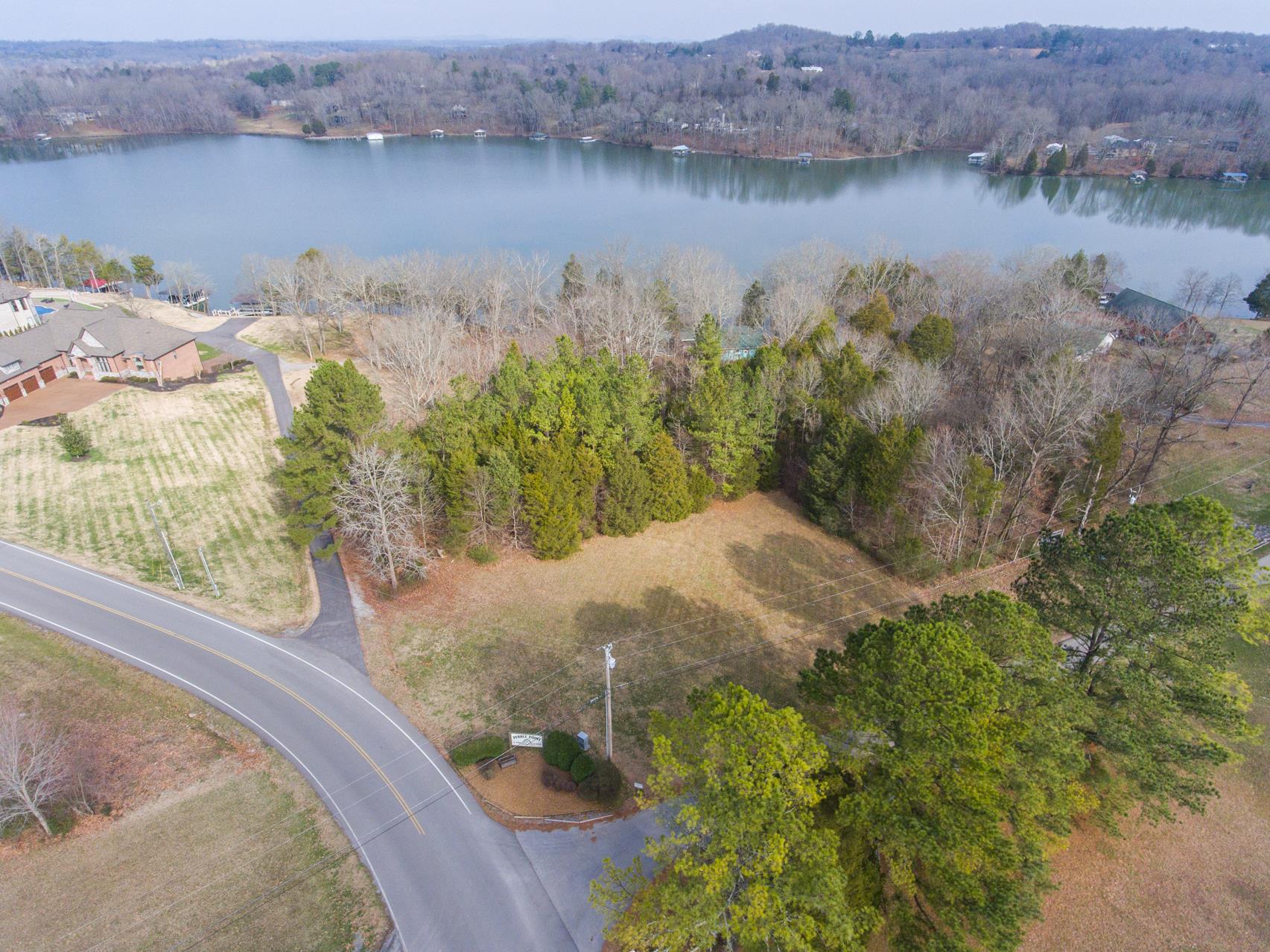 703 Pebble Point Road Lebanon, TN 37087 - Photo 9 of 21 a view of a lake from a yard