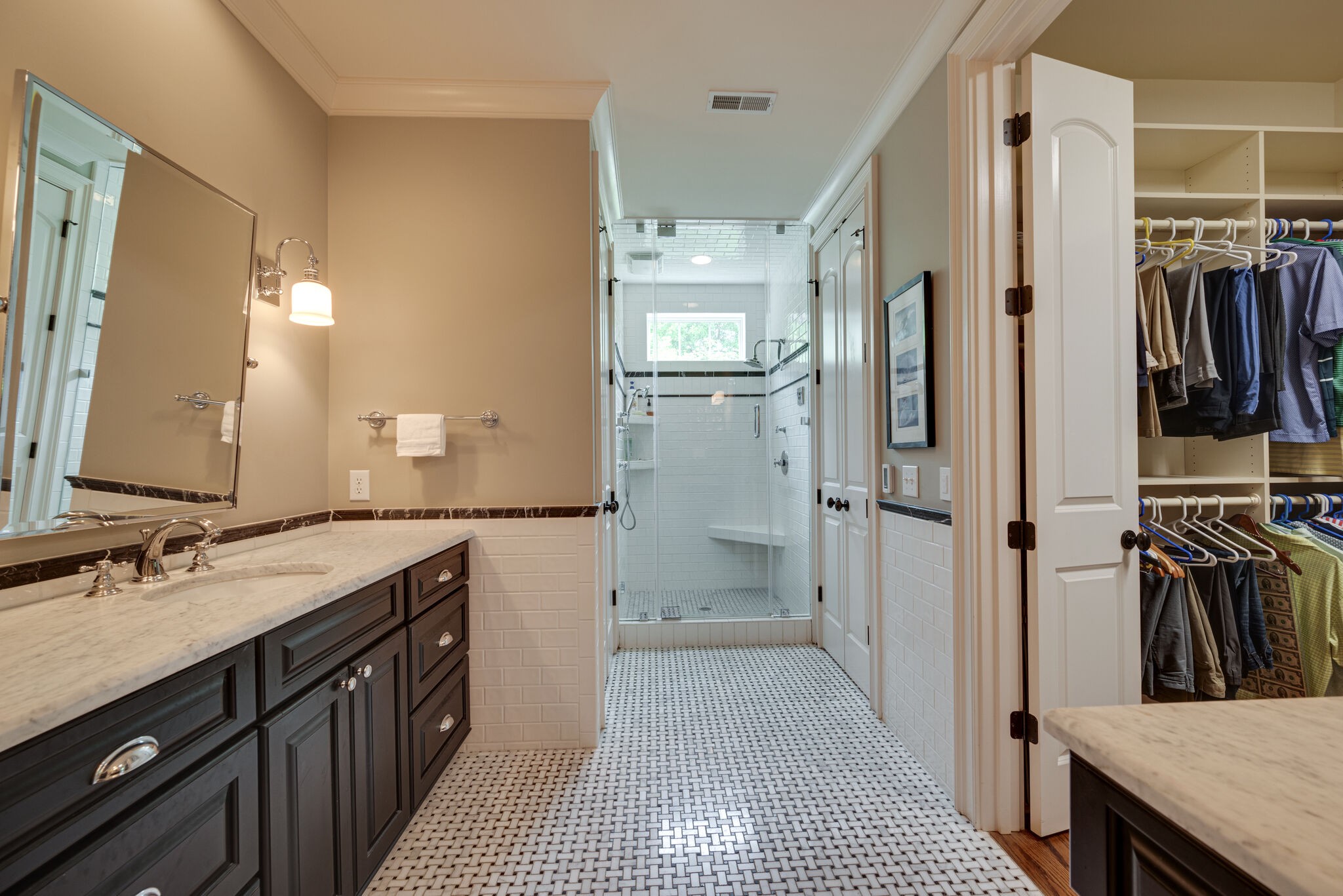 3816 Trimble Road Nashville, TN 37215 - Photo 11 of 26 a bathroom with a sink a mirror and a shower