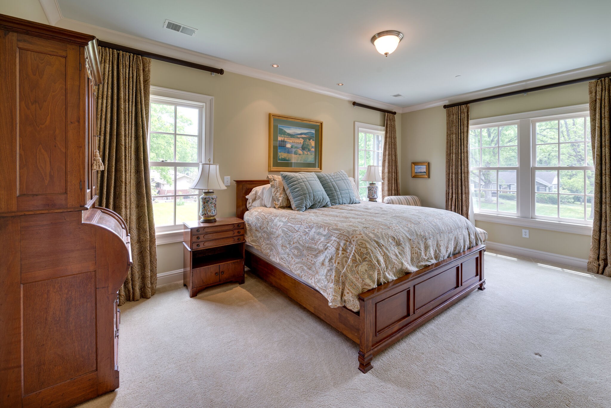 3816 Trimble Road Nashville, TN 37215 - Photo 16 of 26 a bedroom with a large bed and a couch