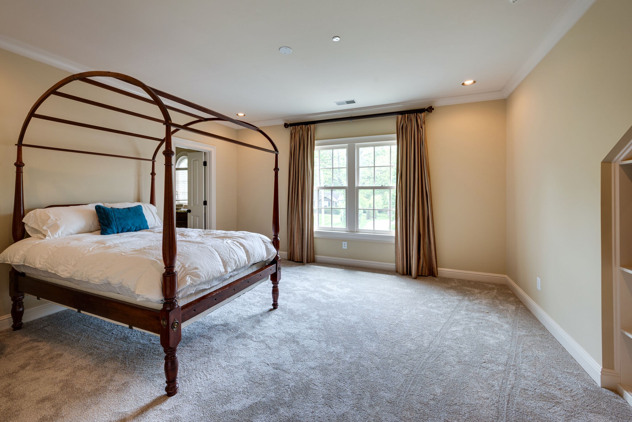 3816 Trimble Road Nashville, TN 37215 - Photo 17 of 26 a bed sitting in a room next to a window