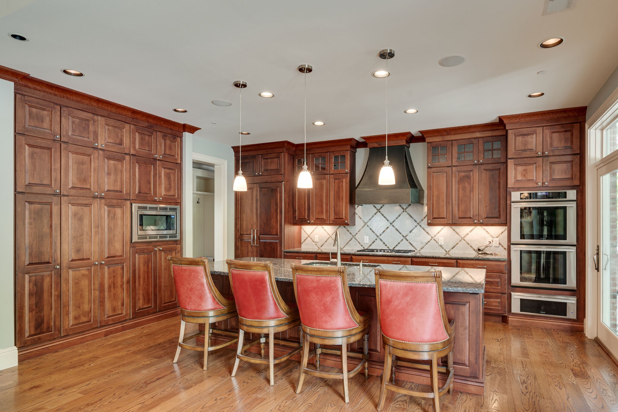 3816 Trimble Road Nashville, TN 37215 - Photo 6 of 26 a kitchen with stainless steel appliances granite countertop a stove and cabinets