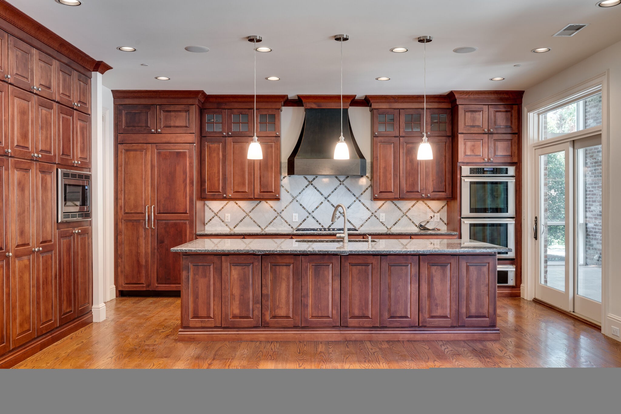3816 Trimble Road Nashville, TN 37215 - Photo 7 of 26 a view of a refrigerator in kitchen and wooden floor