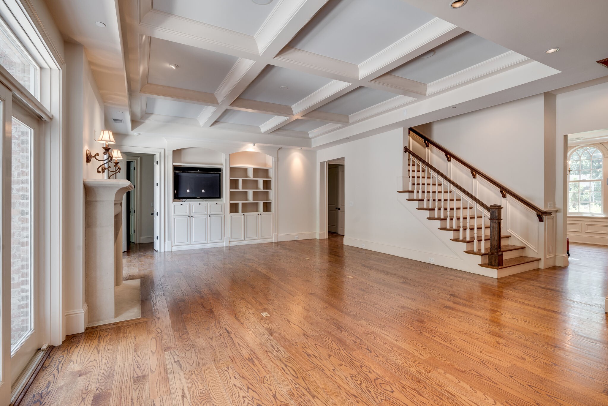3816 Trimble Road Nashville, TN 37215 - Photo 8 of 26 a view of a hallway with wooden floor a fireplace and window