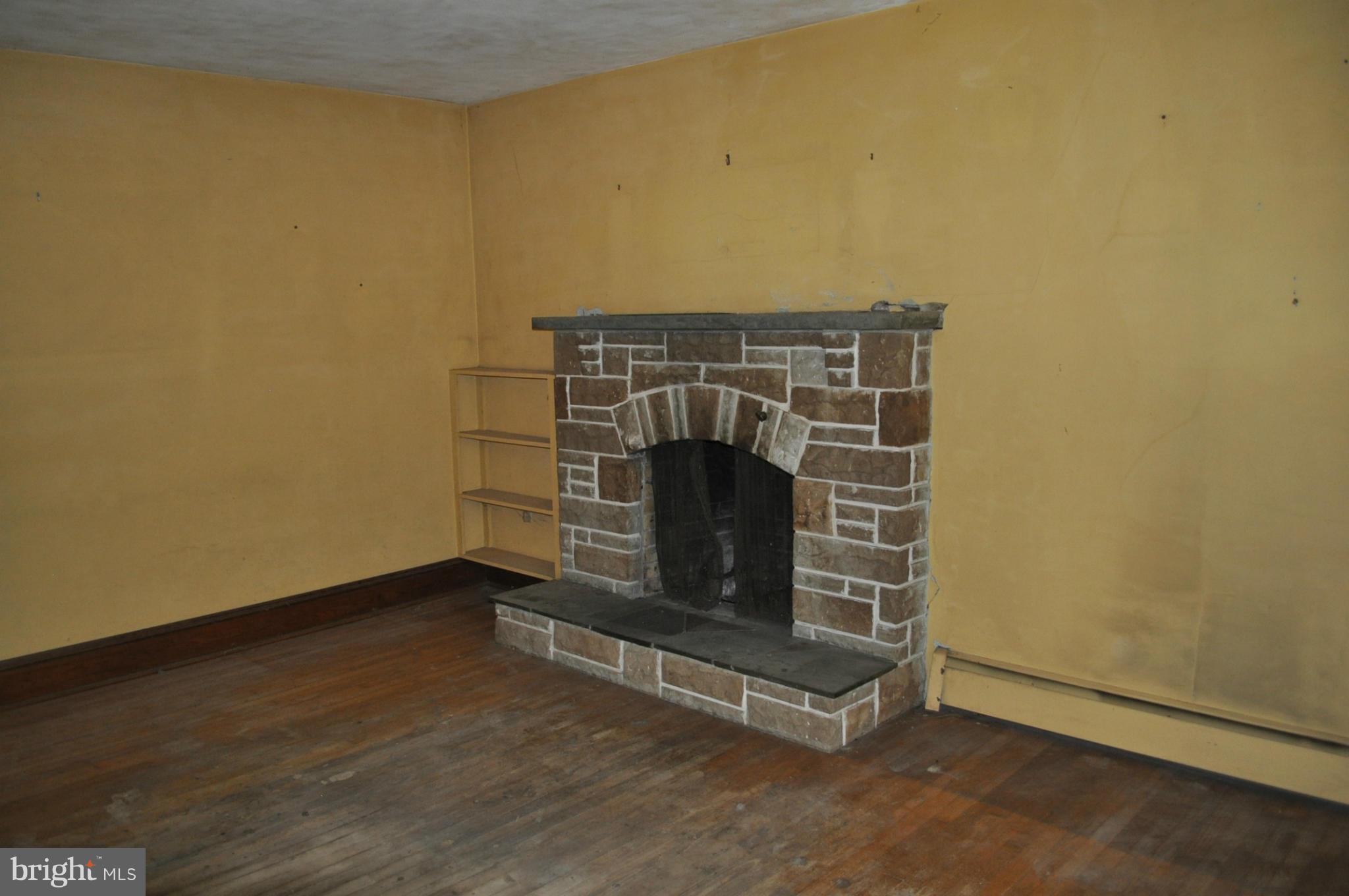 5022 Grand Valley Road Westminster, MD 21158 - Photo 11 of 12 a room with a fireplace