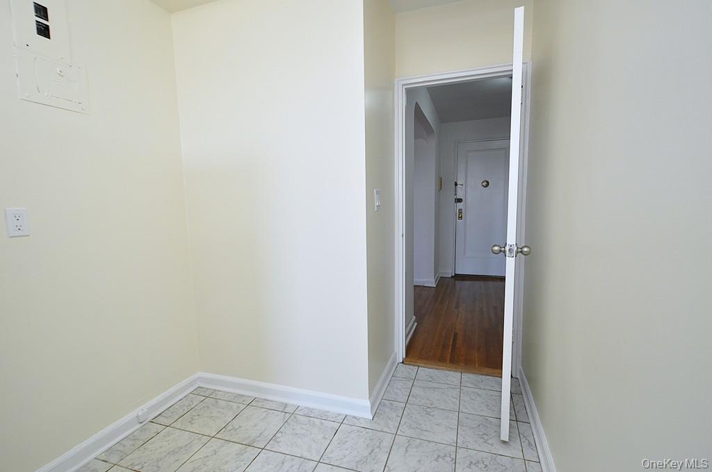 142 Garth Road, Unit 4A Scarsdale, NY 10583 - Photo 13 of 44 a view of an empty room