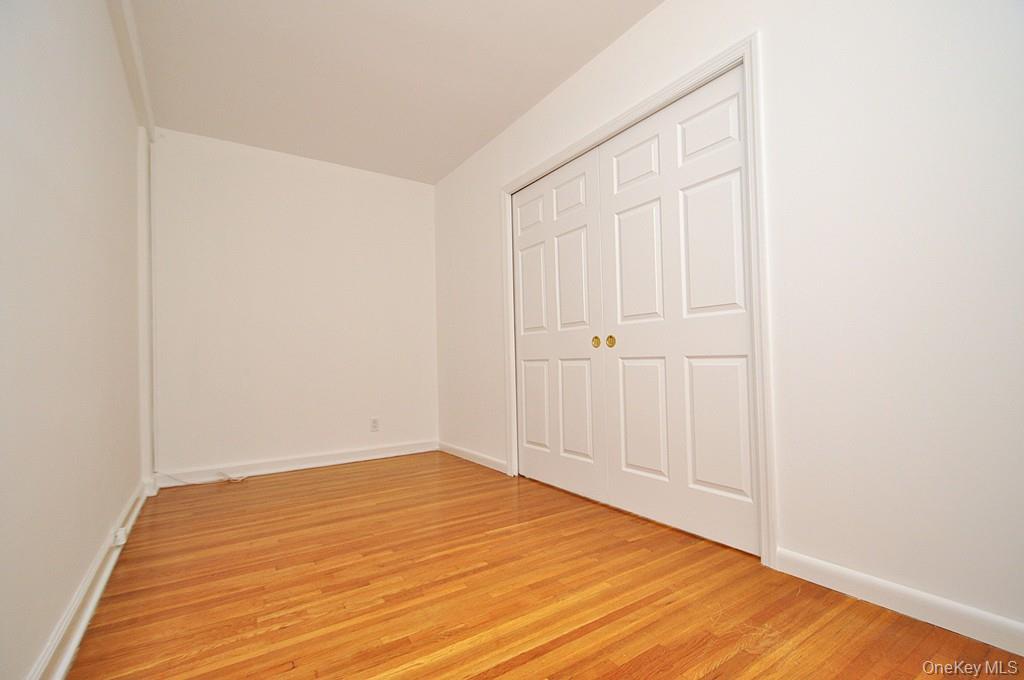 142 Garth Road, Unit 4A Scarsdale, NY 10583 - Photo 18 of 44 a view of empty room
