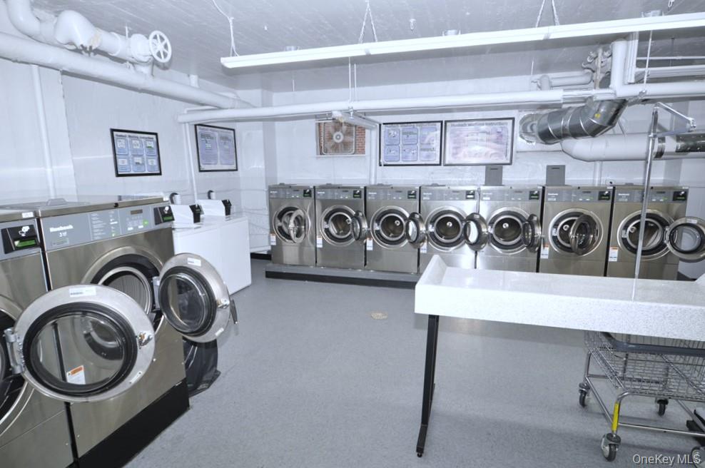 142 Garth Road, Unit 4A Scarsdale, NY 10583 - Photo 32 of 44 a utility room with lots of appliances