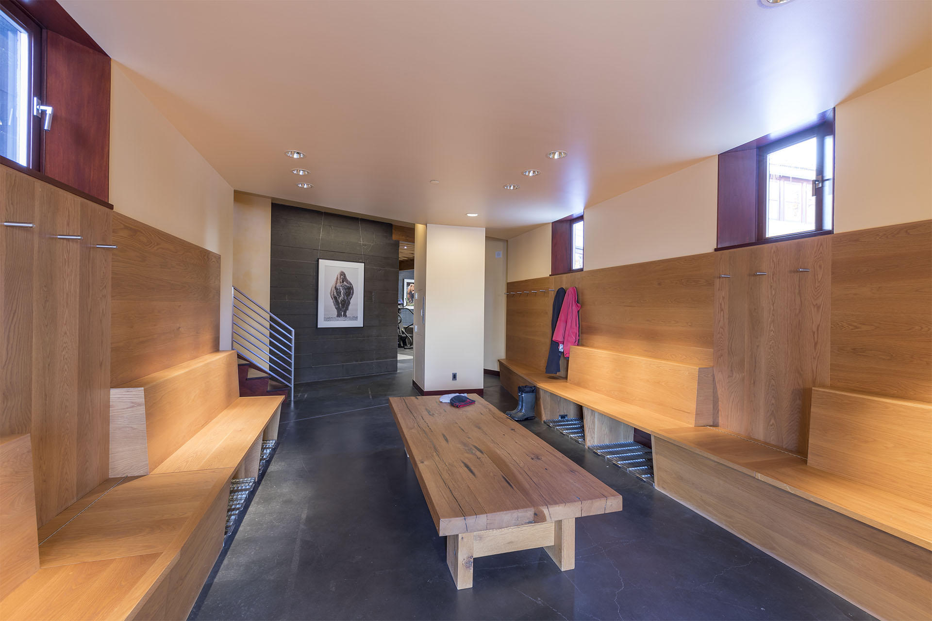700 Elk Crossing Road Placerville, CO 81430 - Photo 20 of 37 a hallway with a couch and wooden floor