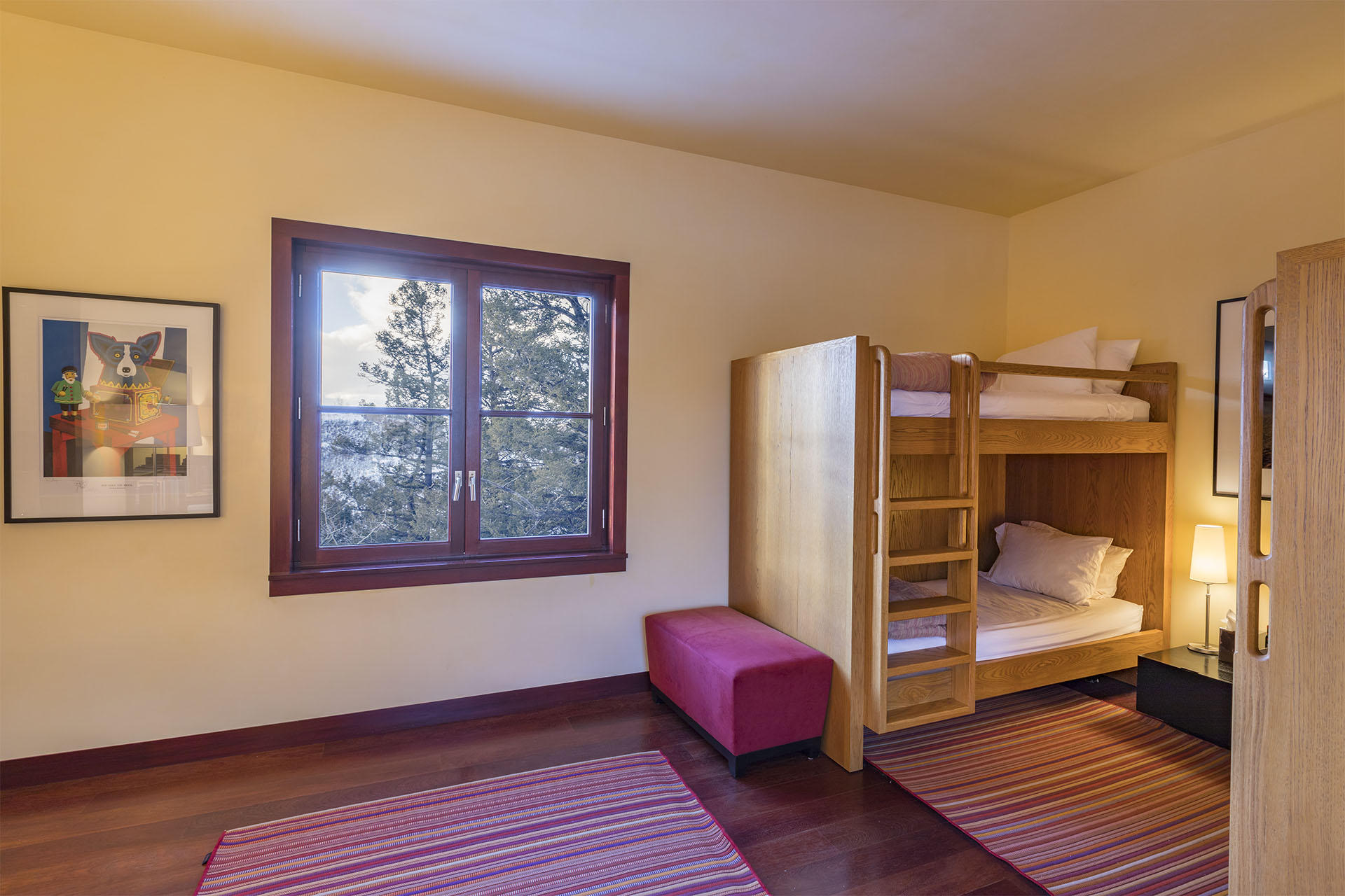 700 Elk Crossing Road Placerville, CO 81430 - Photo 24 of 37 a view of a bedroom with furniture and window