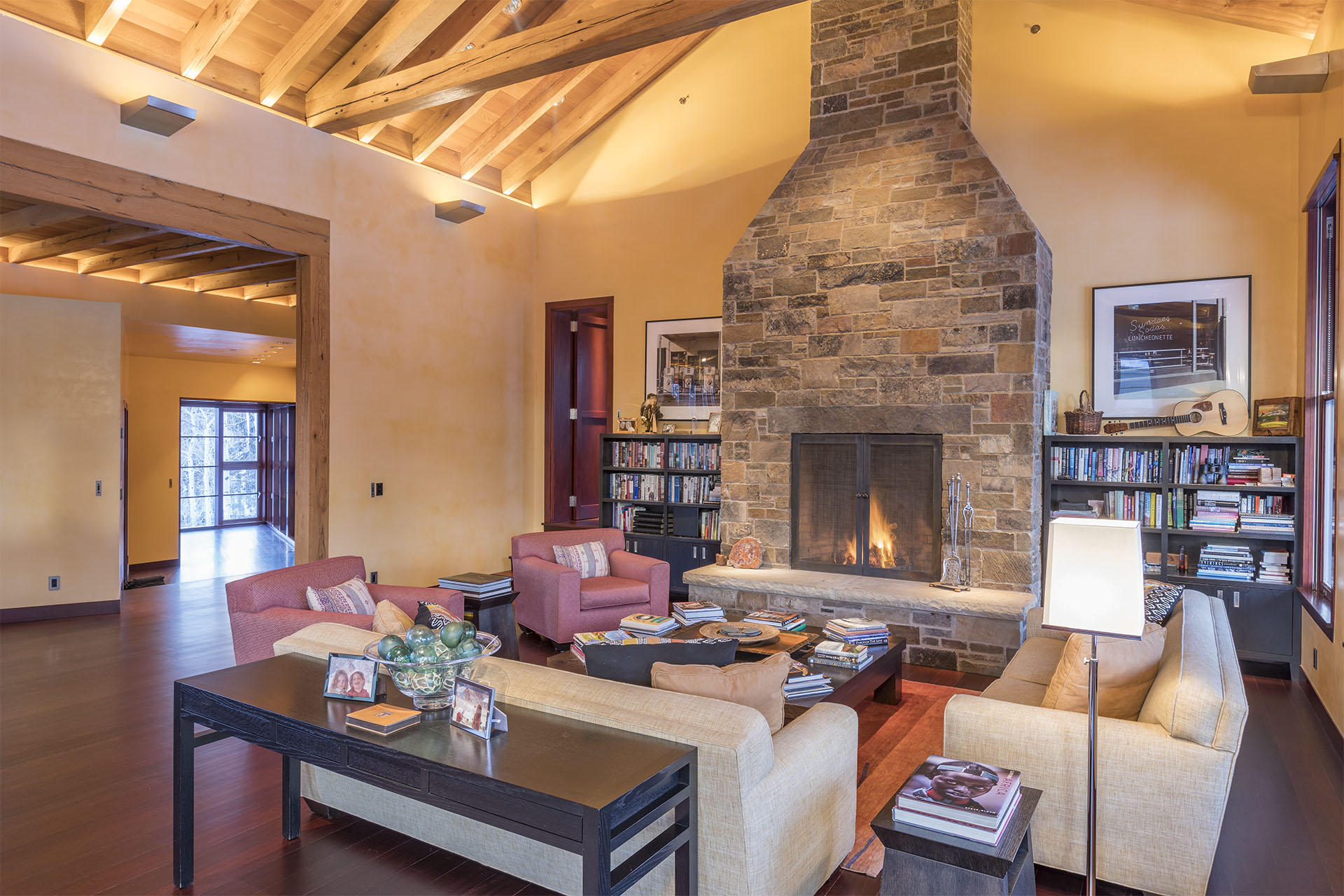 700 Elk Crossing Road Placerville, CO 81430 - Photo 5 of 37 a living room with furniture and a fireplace