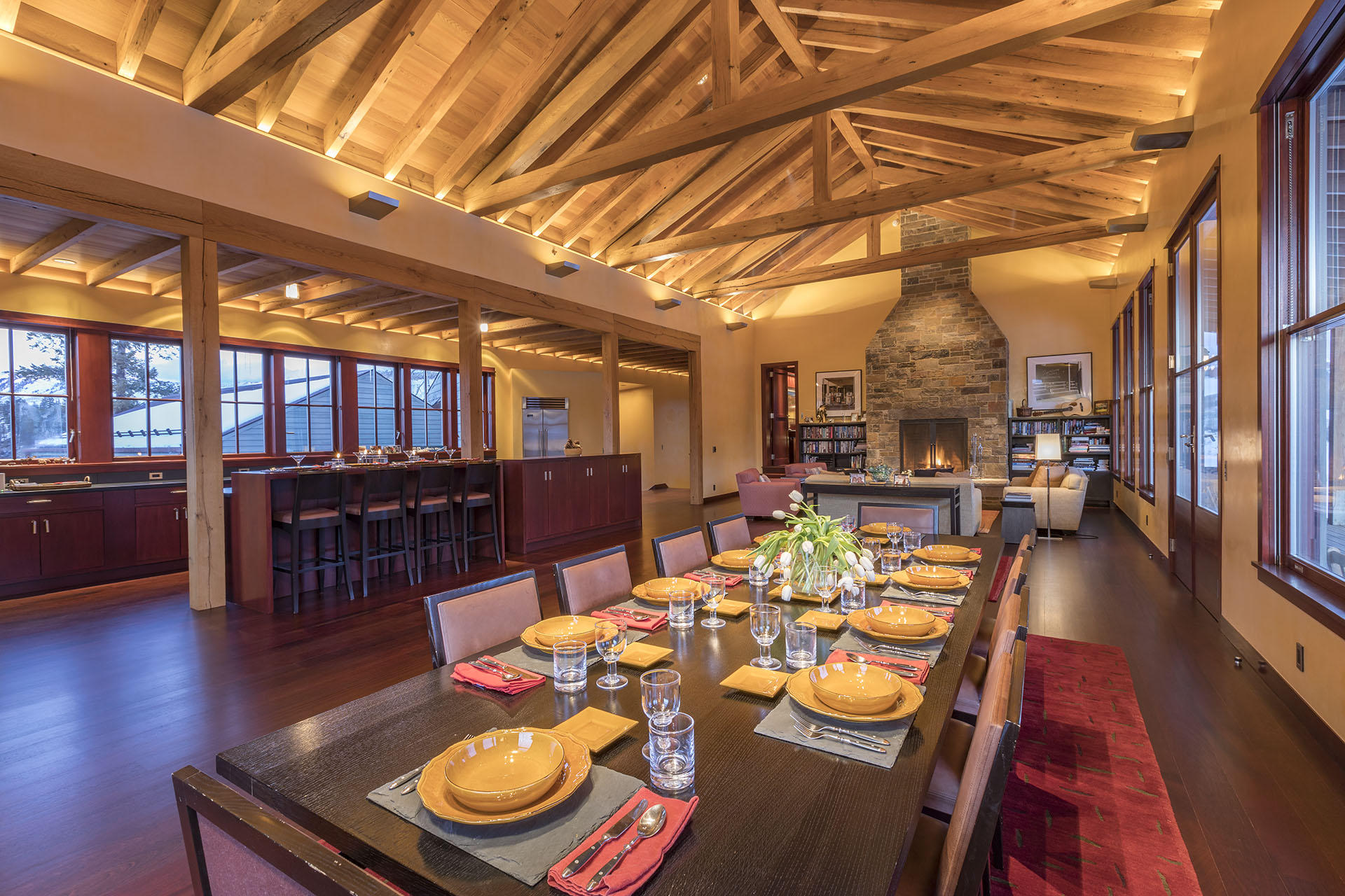 700 Elk Crossing Road Placerville, CO 81430 - Photo 7 of 37 a view of a dining room with furniture wooden floor and a chandelier
