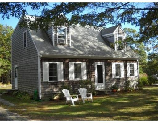 2 Lord Hayford Road Buzzards Bay, MA 02532 - Photo 1 of 16 a front view of house with yard