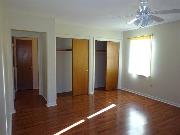 2 Lord Hayford Road Buzzards Bay, MA 02532 - Photo 9 of 16 an empty room with wooden floor and windows